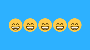 A row of grinning emojis with smiling eyes on a bright blue background